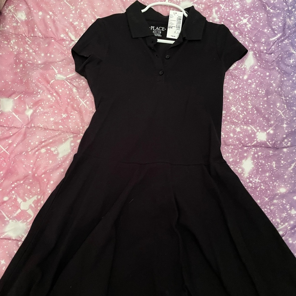 Girls polo shirt style dress.